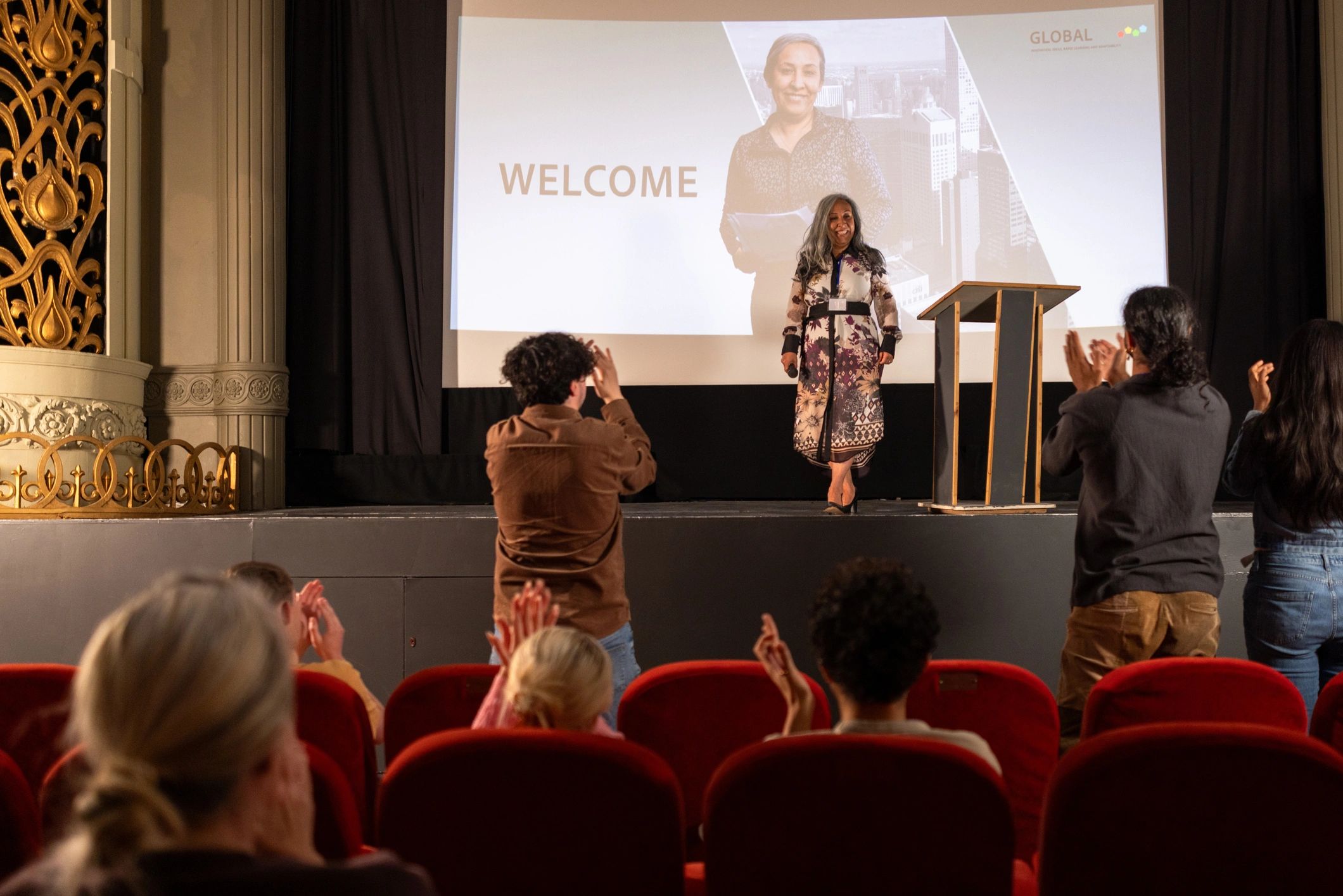 Conference speaker on stage used as a testimonial avatar